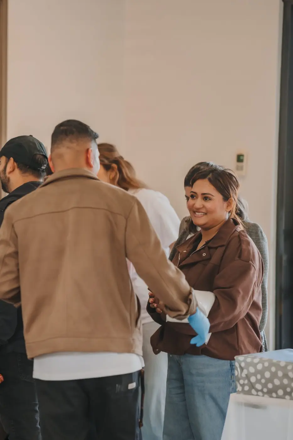 Team members serving food at a group event
