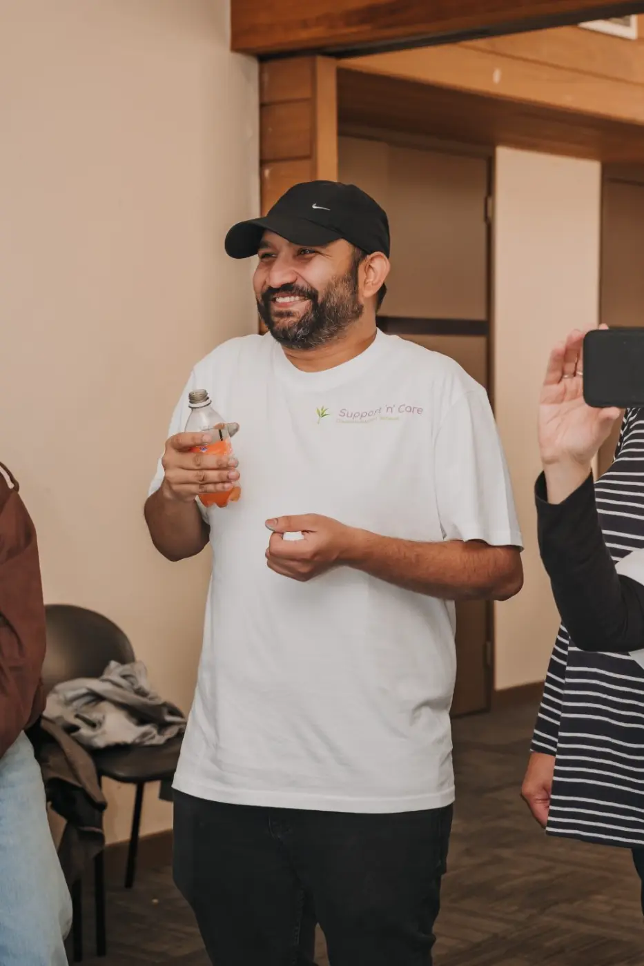 Smiling team member at a group event